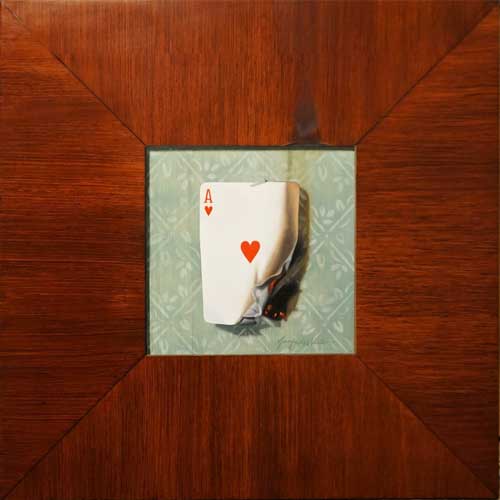 An illusion painting of a brown wooden frame. Inside the frame is ace of heart playing card that is burning. The title of this painting is Heartburn.
